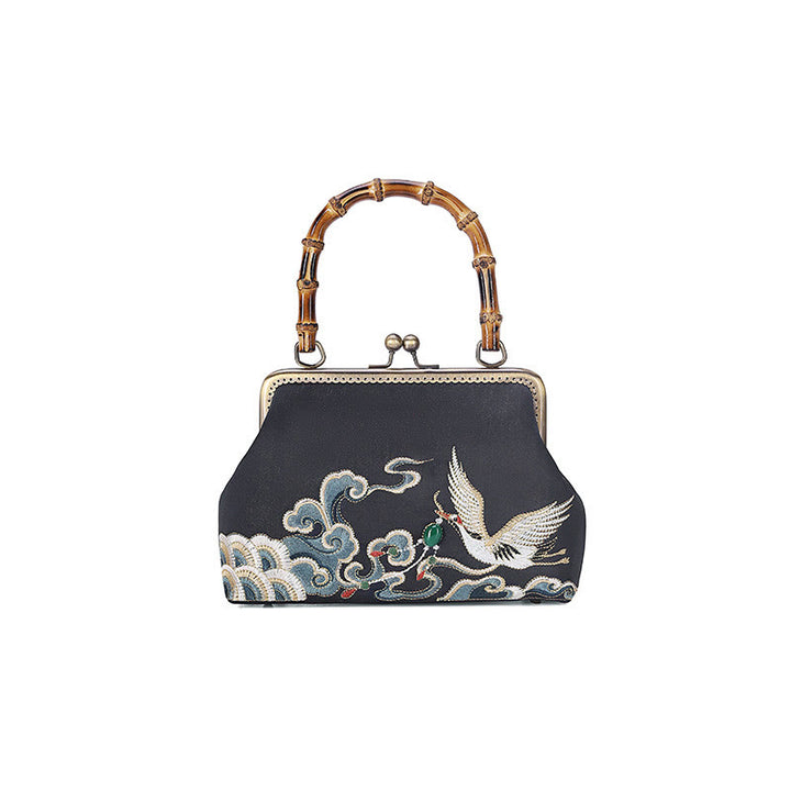 Bolso de asa de bambú con bordado de grullas nubes auspiciosas de piedras de Buda