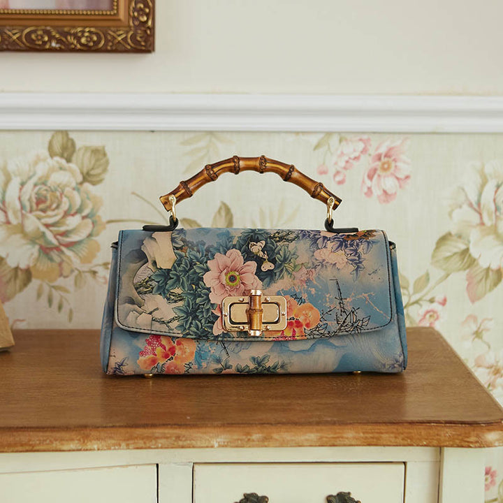 Bolso de cadena cruzada con asa de bambú, patrón de flores y piedras de Buda