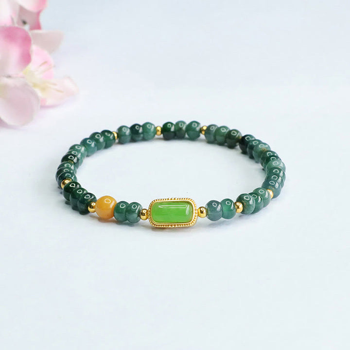 Buddha Stones Pulsera de la suerte de jade verde natural y topacio