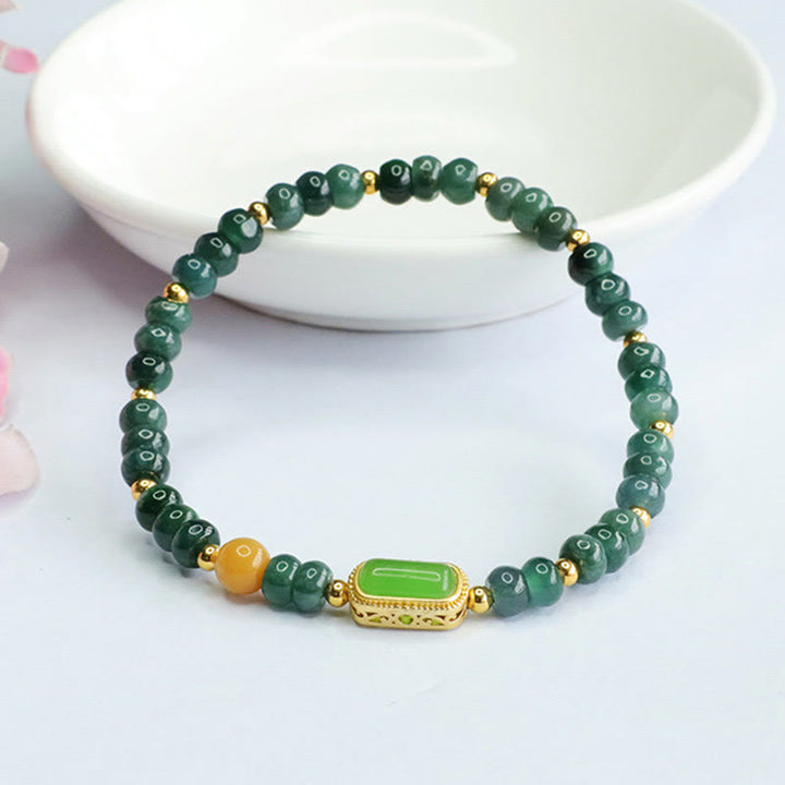 Buddha Stones Pulsera de la suerte de jade verde natural y topacio