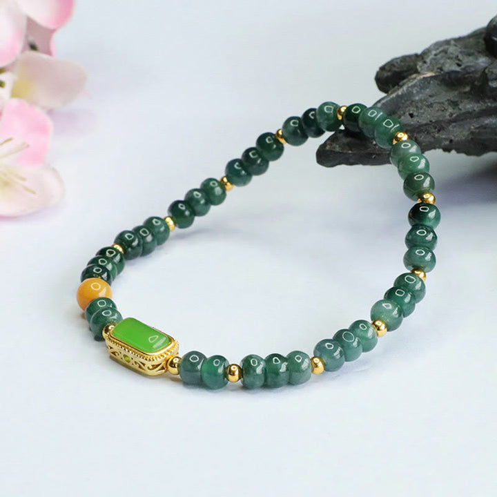 Buddha Stones Pulsera de la suerte de jade verde natural y topacio