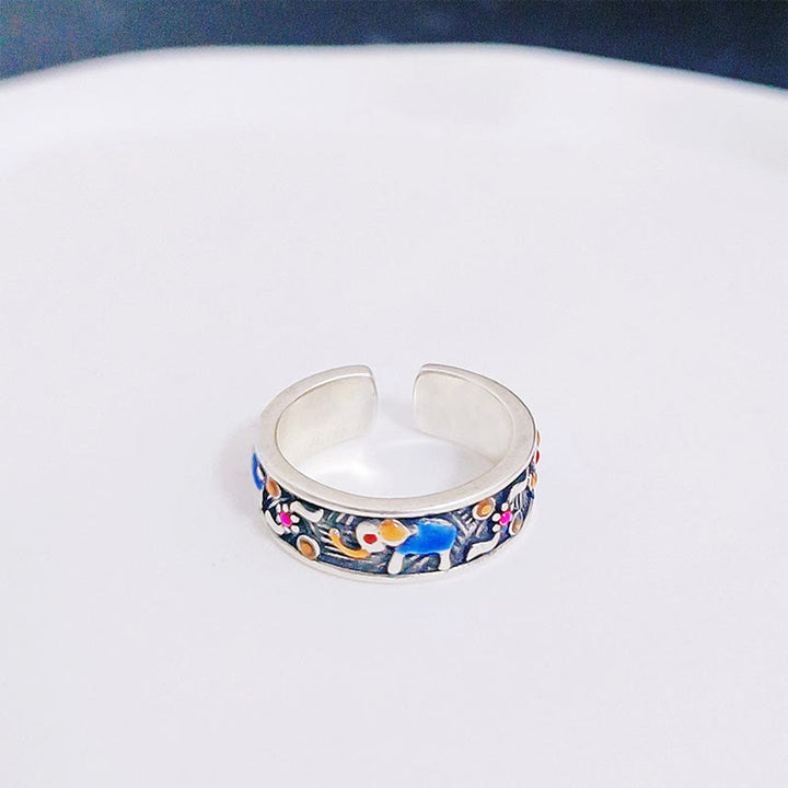 Anillo ajustable de fuerza con elefante tallado colorido de Buddha Stones