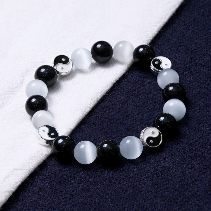 Pulsera de fuerza de purificación Yin Yang de ojo de gato de obsidiana negra con Buddha Stones