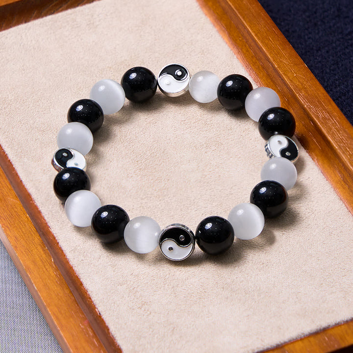 Pulsera de fuerza de purificación Yin Yang de ojo de gato de obsidiana negra con Buddha Stones