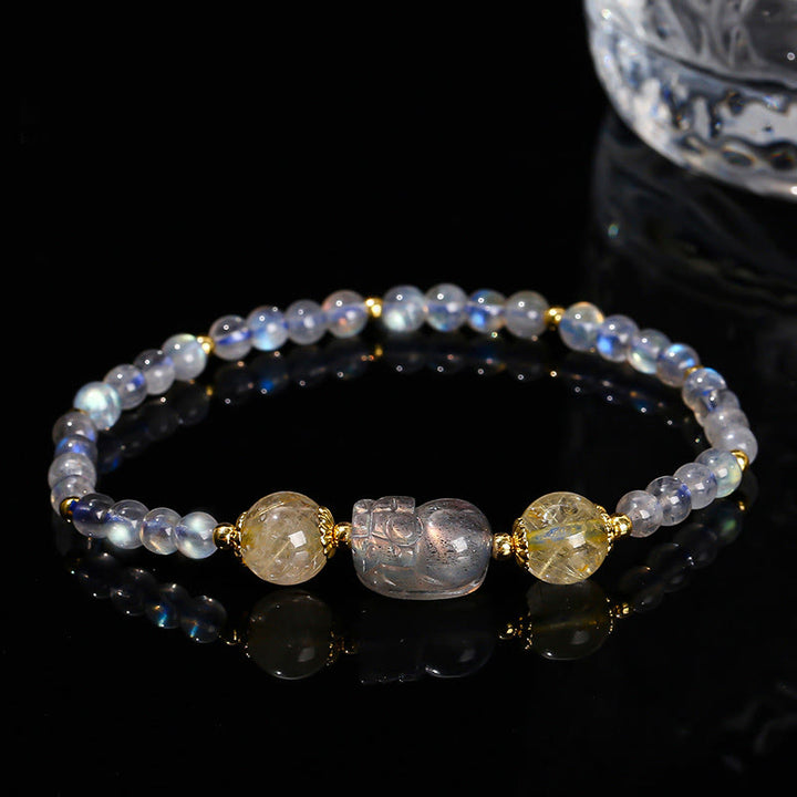 Pulsera de sanación de Buddha Stones con piedra lunar, cuarzo fresa y turmalina PiXiu