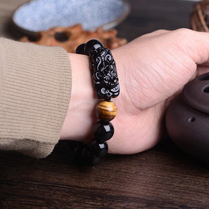 Buddha Stones Pulsera de Fuerza de Ojo de Tigre con PiXiu de Obsidiana Negra Natural