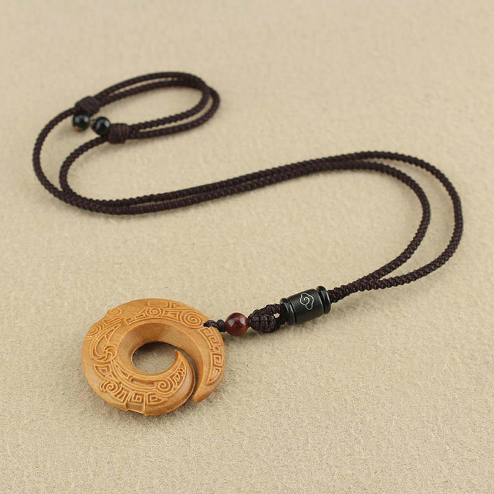 Buddha Stones Madera de Ébano Madera de Sándalo La Suerte Mejora Patrón de Diseño Paz Collar Colgante