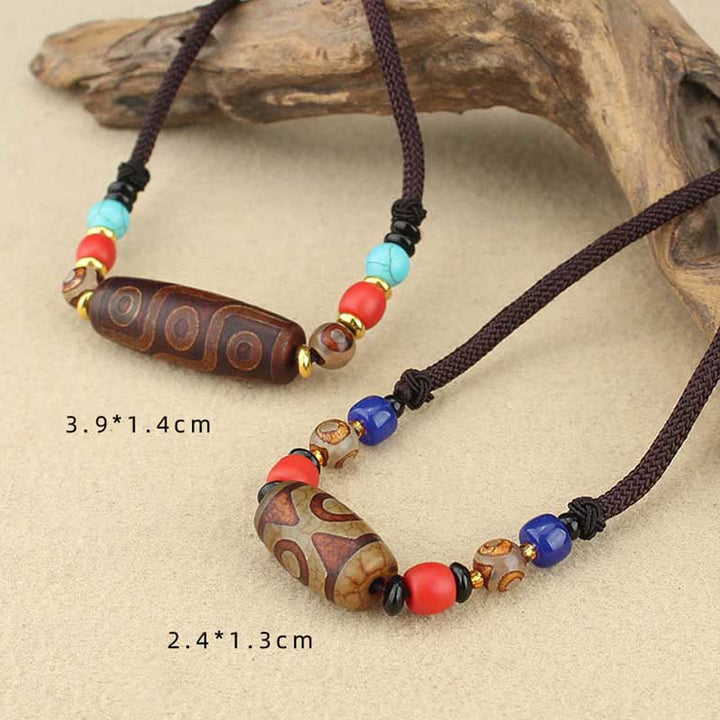 Buddha Stones Collar colgante de abalorio Dzi tibetano de nueve ojos de Dzi de tres ojos cuerda protectora