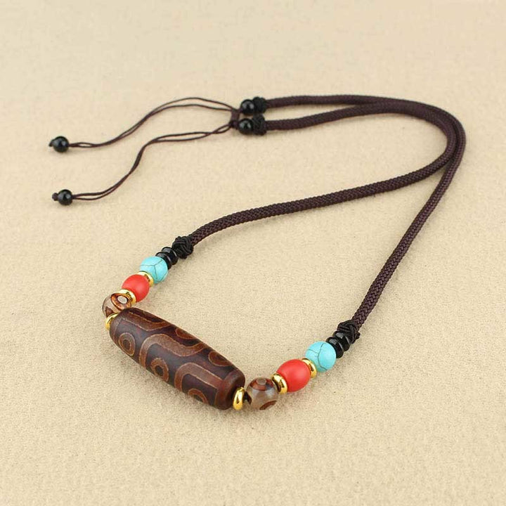 Buddha Stones Collar colgante de abalorio Dzi tibetano de nueve ojos de Dzi de tres ojos cuerda protectora
