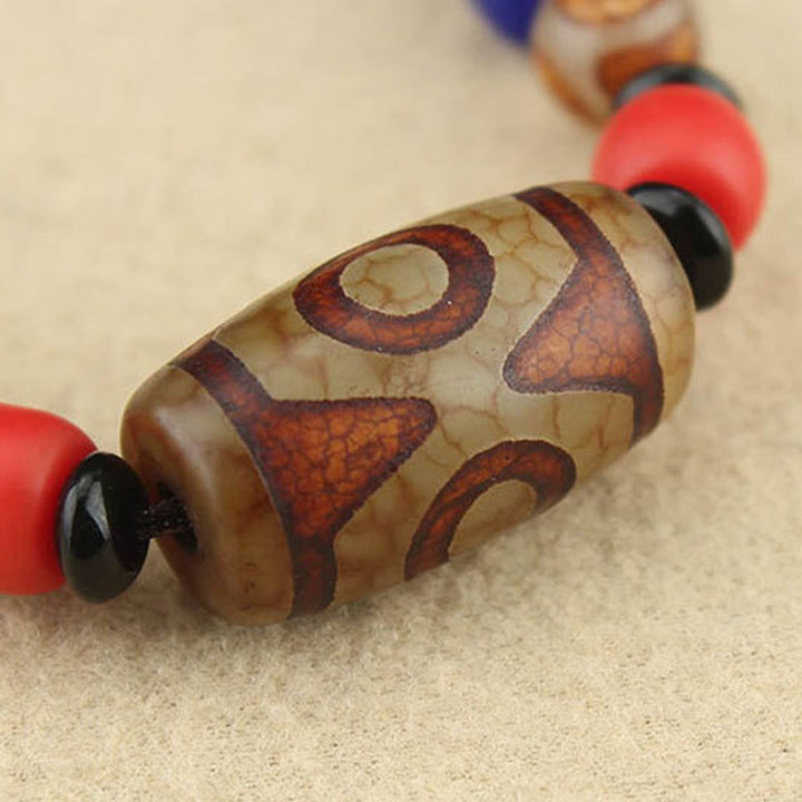 Buddha Stones Collar colgante de abalorio Dzi tibetano de nueve ojos de Dzi de tres ojos cuerda protectora