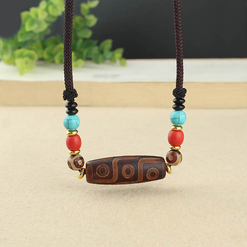 Buddha Stones Collar colgante de abalorio Dzi tibetano de nueve ojos de Dzi de tres ojos cuerda protectora