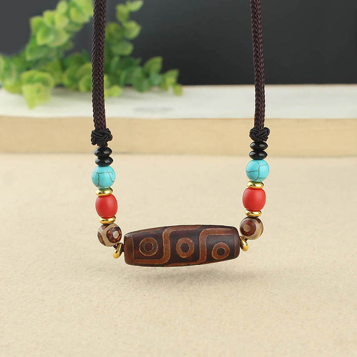 Buddha Stones Collar colgante de abalorio Dzi tibetano de nueve ojos de Dzi de tres ojos cuerda protectora