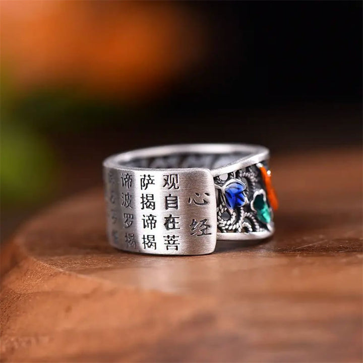 Buddha Stones Anillo de la suerte con Sutra del corazón de loto y pez Koi de esmalte azul cobre