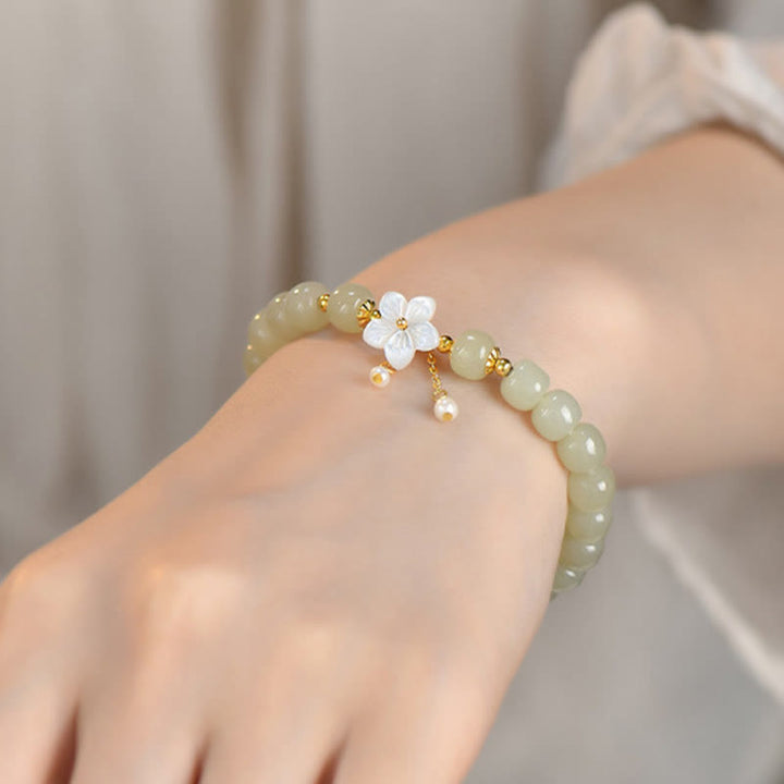 Pulsera de flor de la suerte de jade Hetian natural de plata esterlina 925 de Buddha Stones