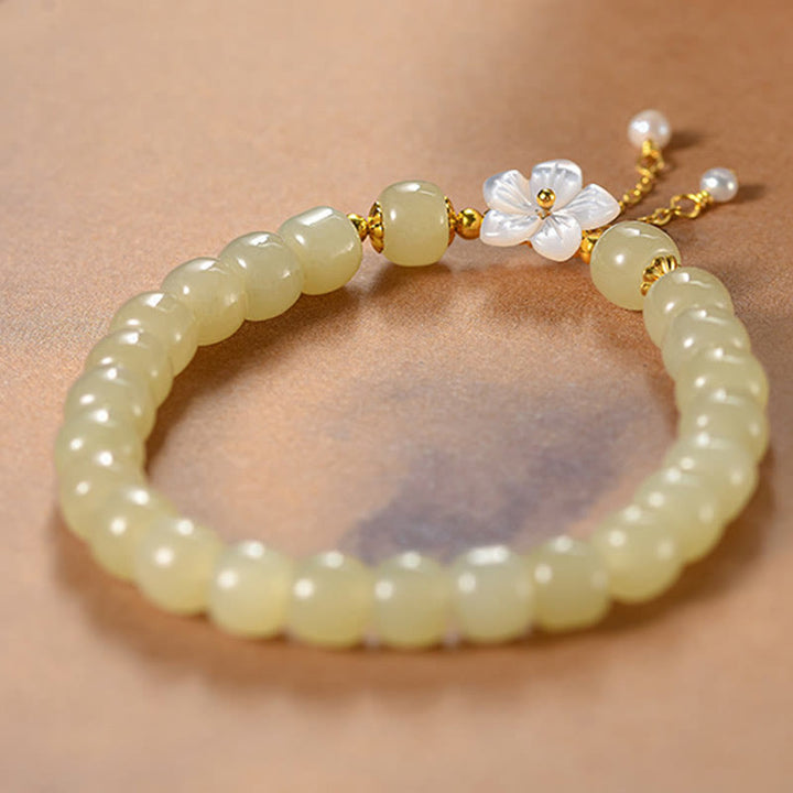 Pulsera de flor de la suerte de jade Hetian natural de plata esterlina 925 de Buddha Stones
