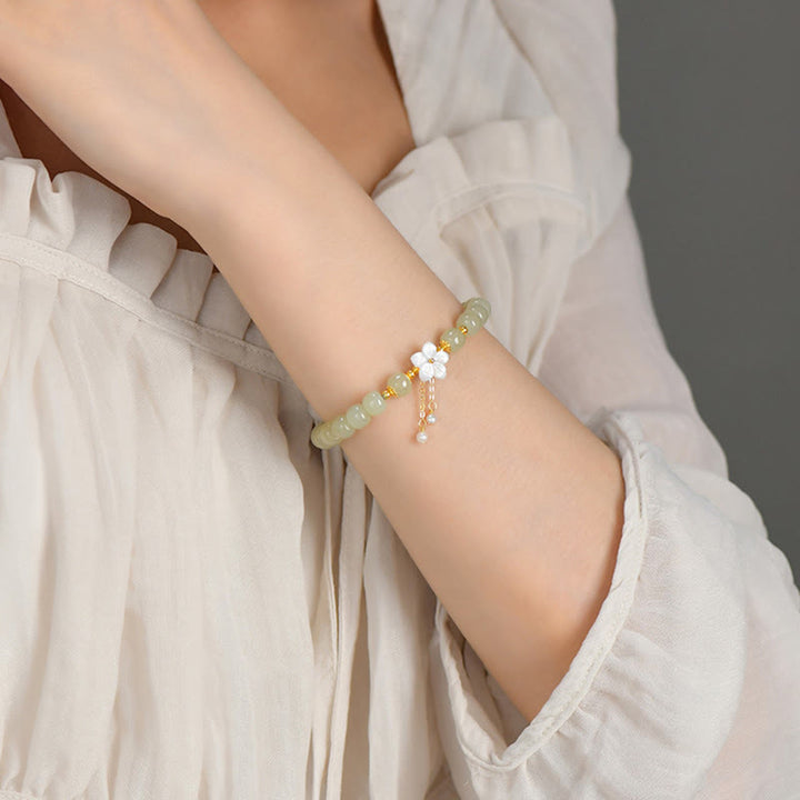Pulsera de flor de la suerte de jade Hetian natural de plata esterlina 925 de Buddha Stones