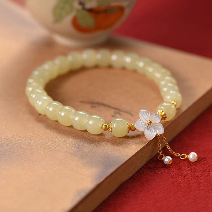 Pulsera de flor de la suerte de jade Hetian natural de plata esterlina 925 de Buddha Stones