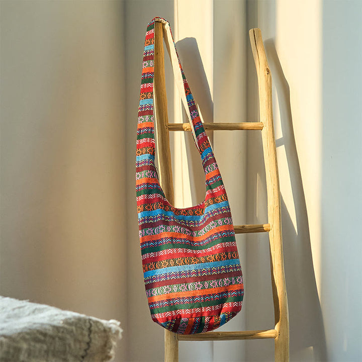 Bolso bandolera de algodón con patrón de rayas geométricas coloreadas Buddha Stones