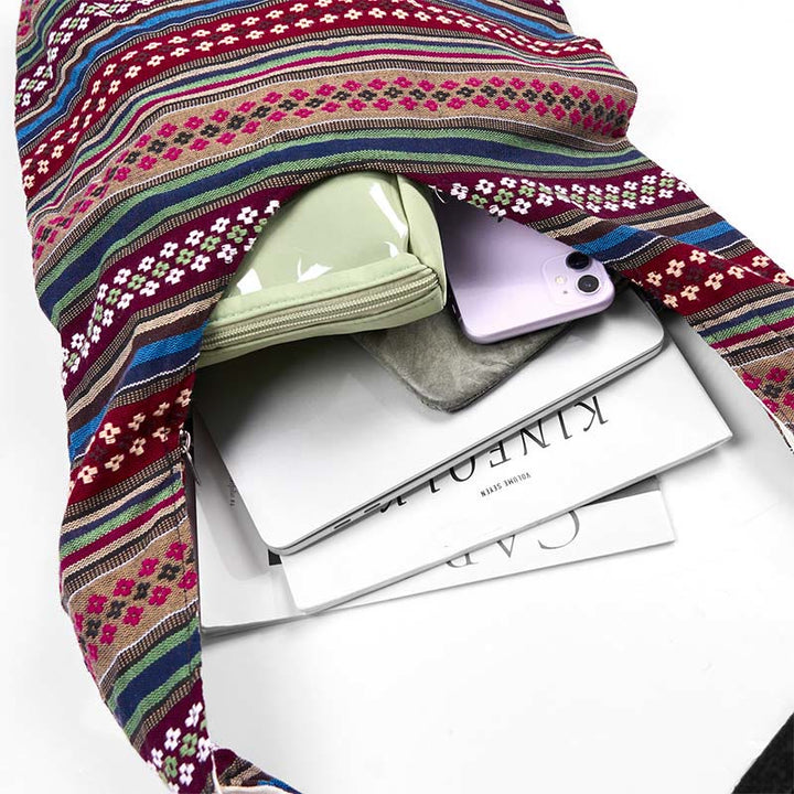 Bolso bandolera de algodón con patrón de rayas geométricas coloreadas Buddha Stones