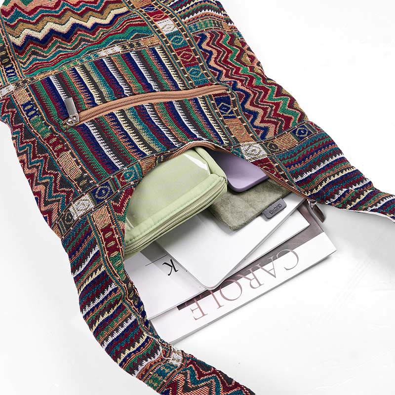 Bolso bandolera de algodón con patrón de ondas verdes y marrones de Buddha Stones