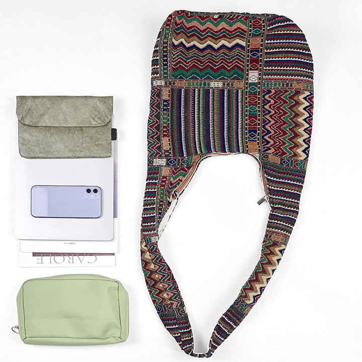 Bolso bandolera de algodón con patrón de ondas verdes y marrones de Buddha Stones