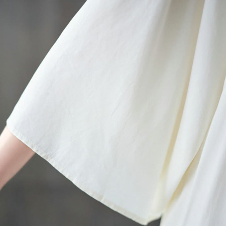 Vestido midi con bordados de Buddha Stones, bajo con volantes y bolsillos - image 8