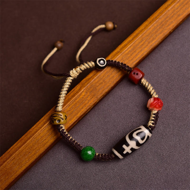Buddha Stones Pulsera de Cuerda Trenzada con Cuentas Tibetanas Hechas a Mano para la Riqueza