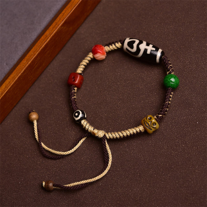 Buddha Stones Pulsera de Cuerda Trenzada con Cuentas Tibetanas Hechas a Mano para la Riqueza
