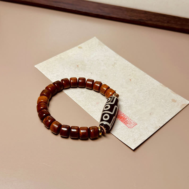 Pulsera protectora de cuentas dzi de nueve ojos con cuentas de hueso tibetano de Buddha Stones