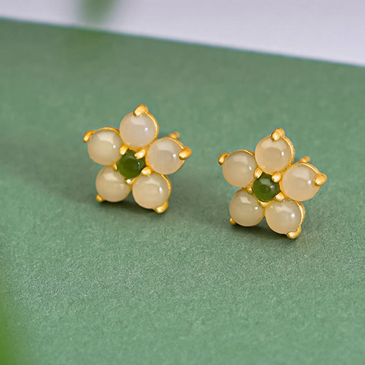 Buddha Stones Pendientes de plata esterlina 925 con jade de Hetian y flor de la suerte