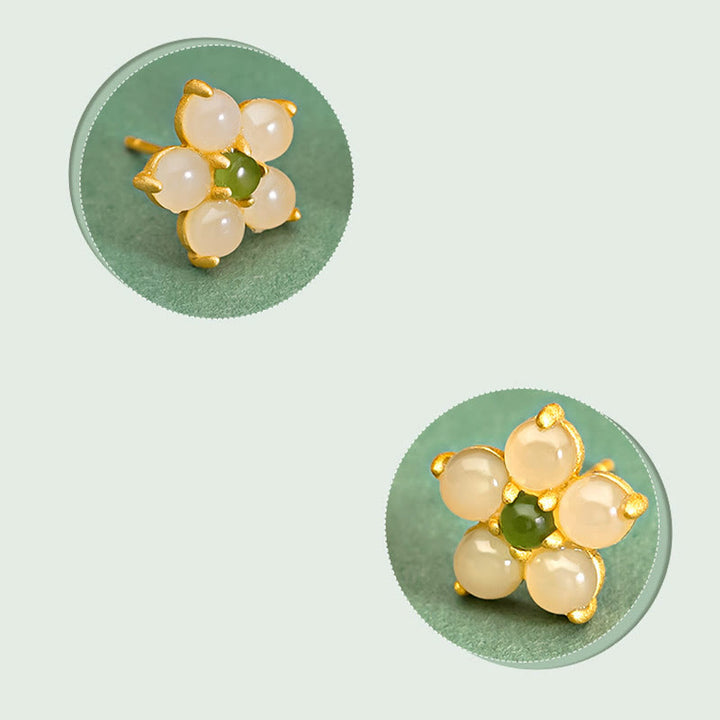 Buddha Stones Pendientes de plata esterlina 925 con jade de Hetian y flor de la suerte