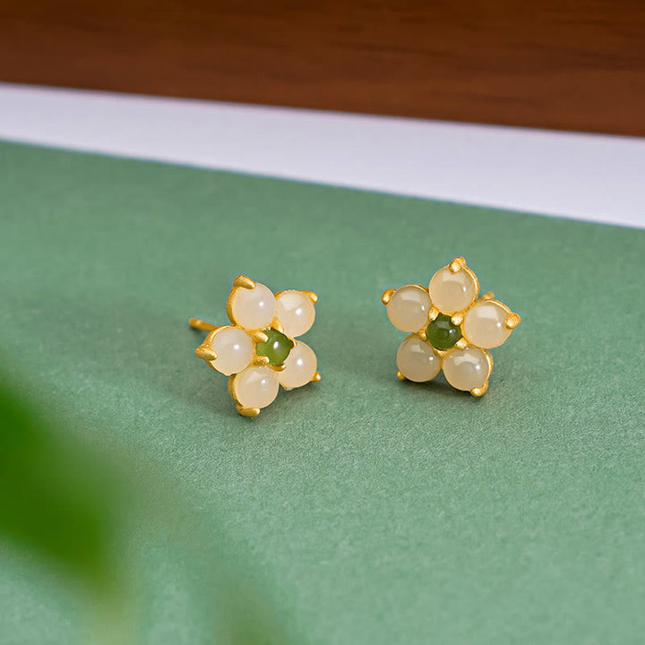 Buddha Stones Pendientes de plata esterlina 925 con jade de Hetian y flor de la suerte