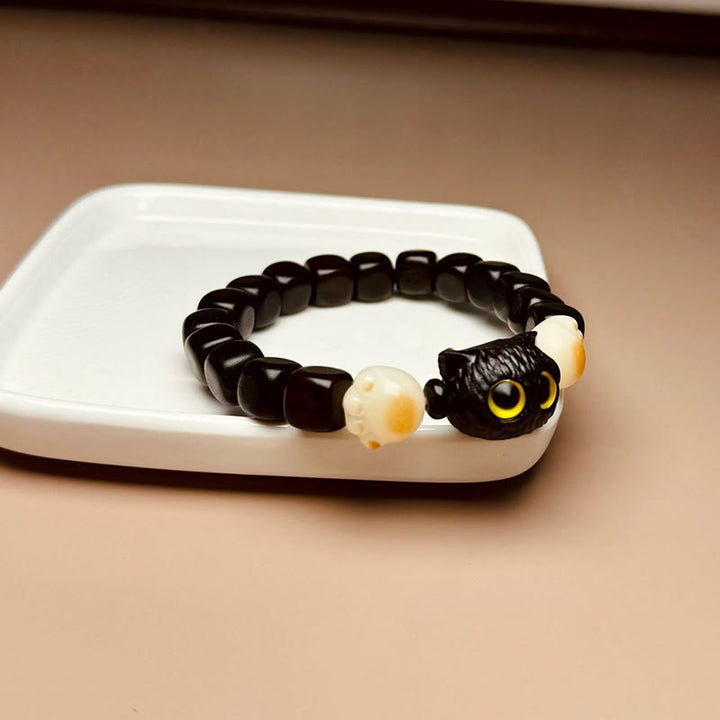 "Buddha Stones Pulsera de Claw de Paz de Bodhi Seed de Pata de Gato Adorable de Madera de Ébano" - image 9