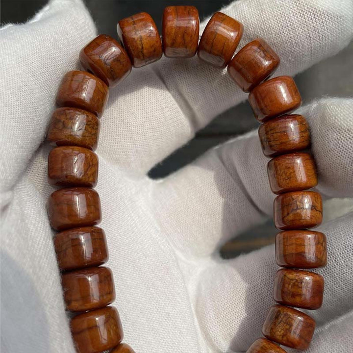 Pulsera de fuerza con Buddha Stones de hueso tibetano, cuentas Dzi de tres ojos, cuerno de oveja y ágata roja