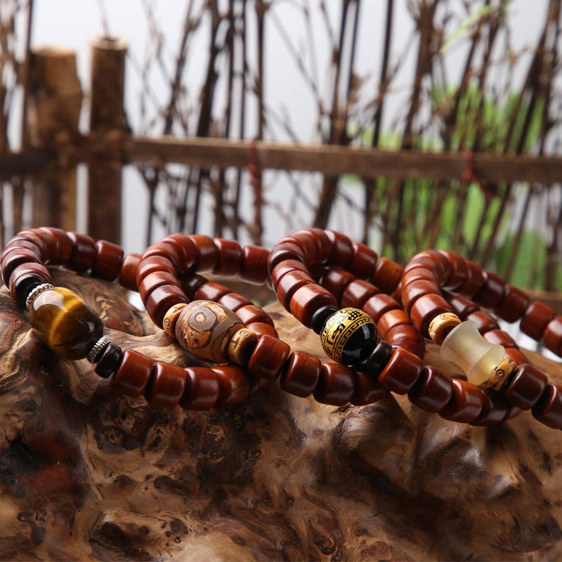 Pulsera de fuerza con Buddha Stones de hueso tibetano, cuentas Dzi de tres ojos, cuerno de oveja y ágata roja