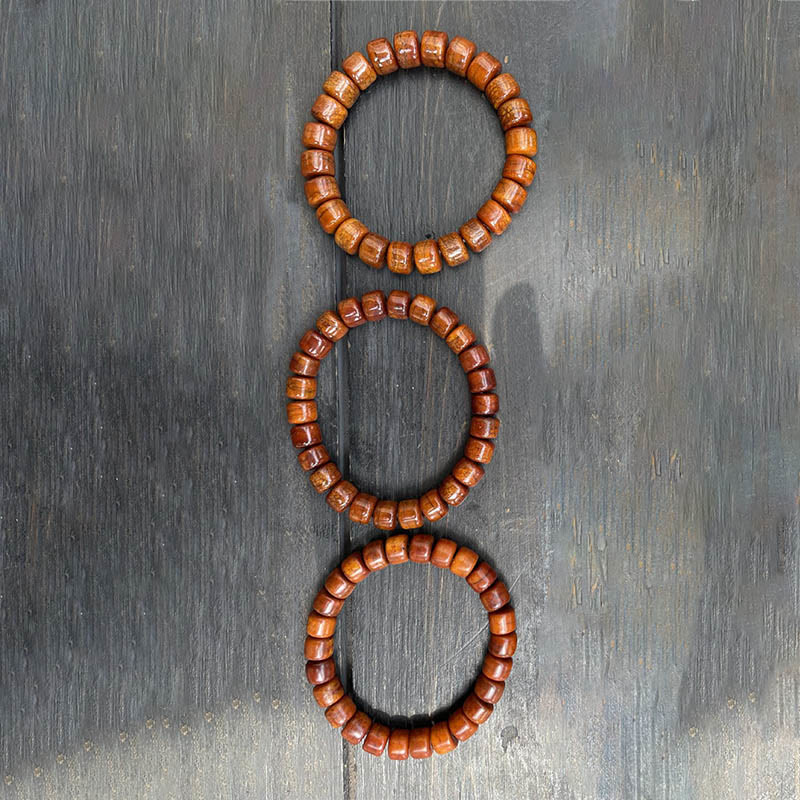 Pulsera de fuerza con Buddha Stones de hueso tibetano, cuentas Dzi de tres ojos, cuerno de oveja y ágata roja