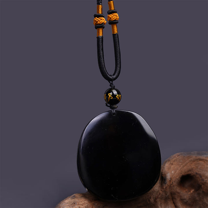 Buddha Stones Colgante de protección de obsidiana negra natural redonda con dragón tallado