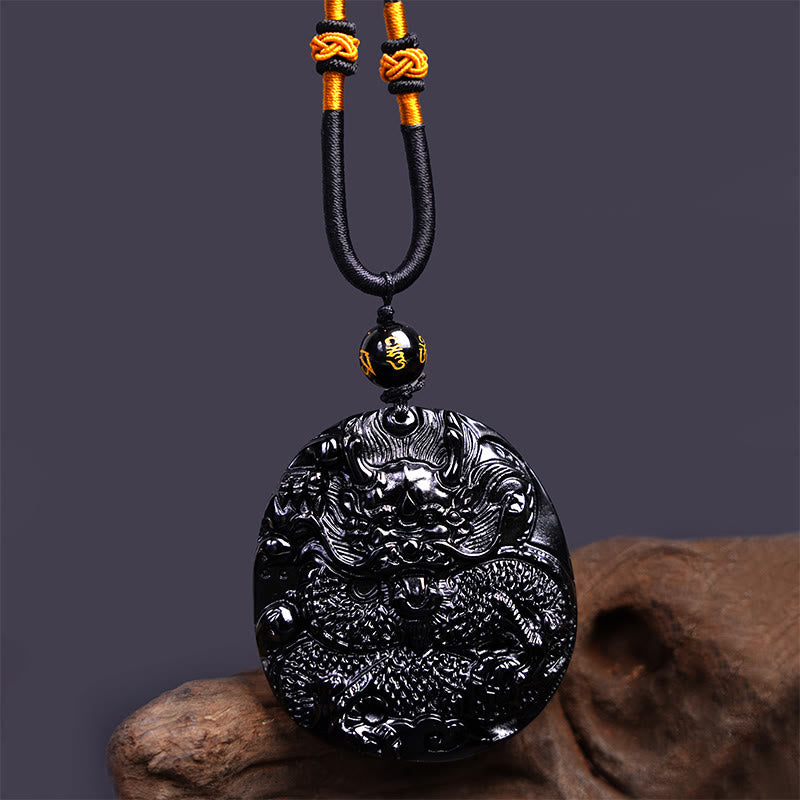 Buddha Stones Colgante de protección de obsidiana negra natural redonda con dragón tallado