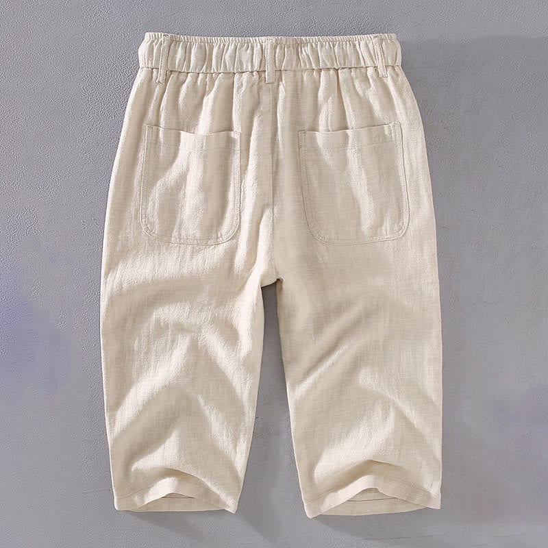 Pantalones cortos de lino ramio de color liso con cordón ajustable y bolsillos para hombre de Buddha Stones. - image 1