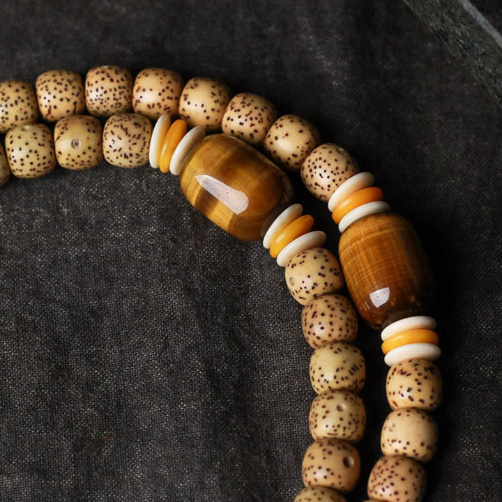 Buddha Stones 108 cuentas Mala de semilla de bodhi, ojo de tigre, carácter Fu, pulsera de paz