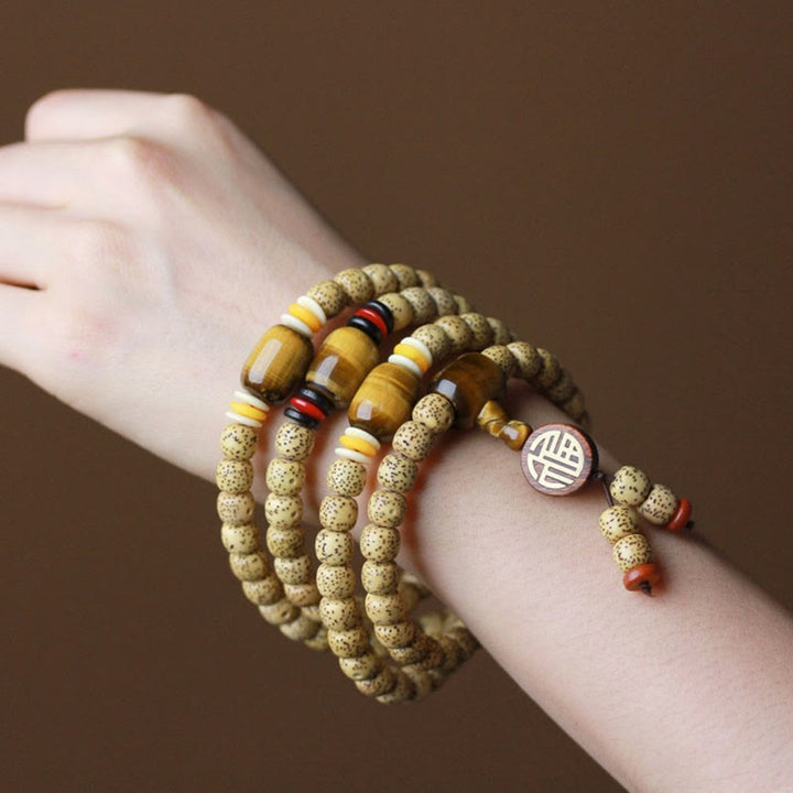 Buddha Stones 108 cuentas Mala de semilla de bodhi, ojo de tigre, carácter Fu, pulsera de paz