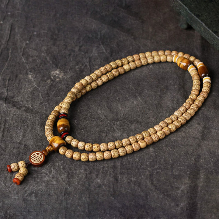 Buddha Stones 108 cuentas Mala de semilla de bodhi, ojo de tigre, carácter Fu, pulsera de paz