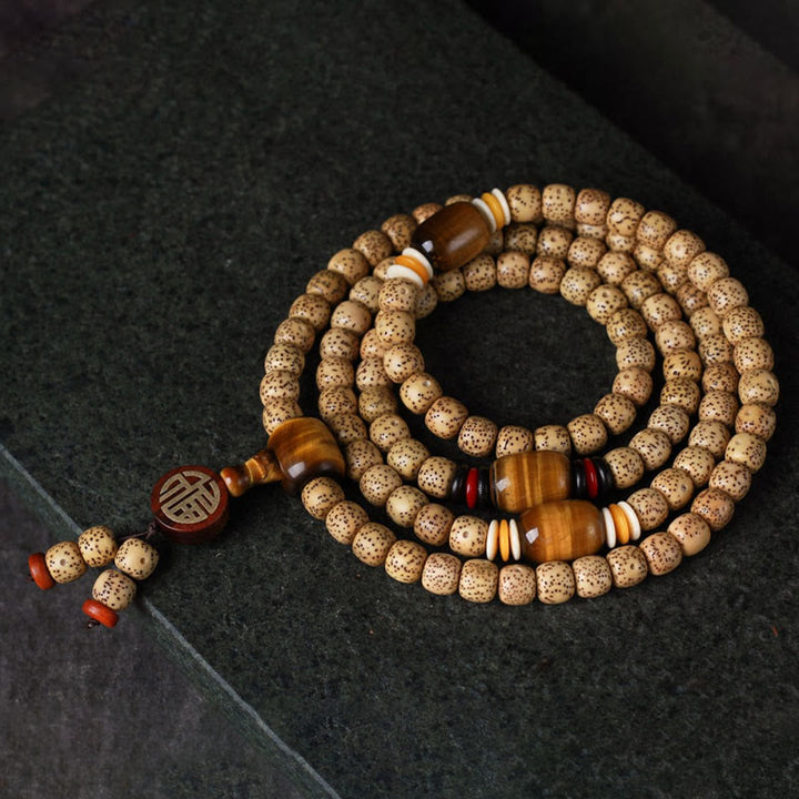 Buddha Stones 108 cuentas Mala de semilla de bodhi, ojo de tigre, carácter Fu, pulsera de paz