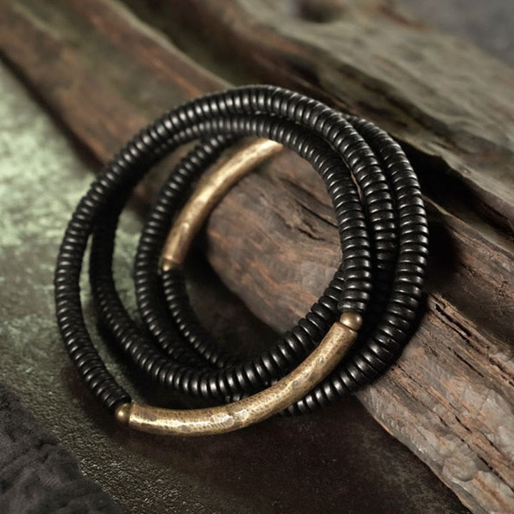 Buddha Stones Pulsera de Madera de Ébano Tibetano con Cuentas de Cobre y Capas de Paz