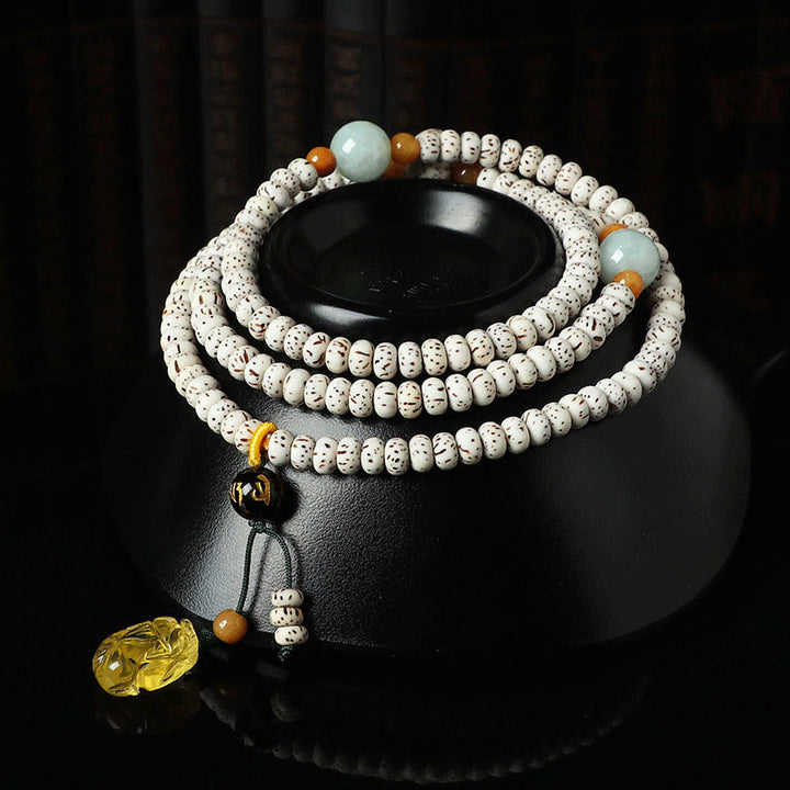 Buddha Stones Pulsera de riqueza de ámbar y ágata con semilla de Bodhi tibetana
