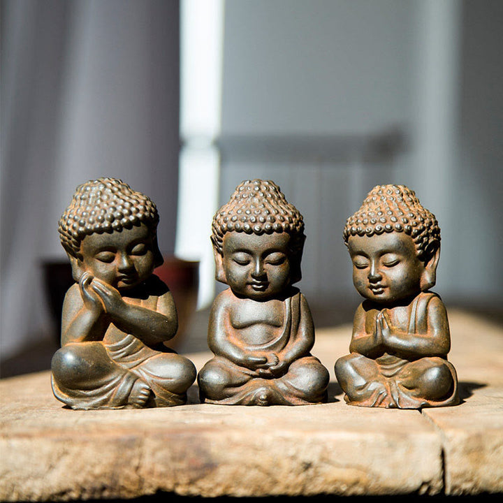 Buddha Stones Estatua decorativa hecha a mano de resina con polvo de hierro oxidado de Buda Sakyamuni pequeño - Versión Rust - 3 piezas de Buda - image 0