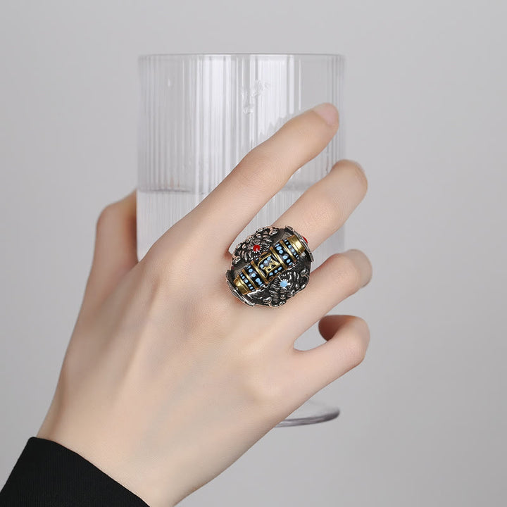 Buddha Stones Anillo Giratorio de la Paz con Patrón de Cuentas Dzi Tibetanas de Garuda y el Mantra Om Mani Padme Hum