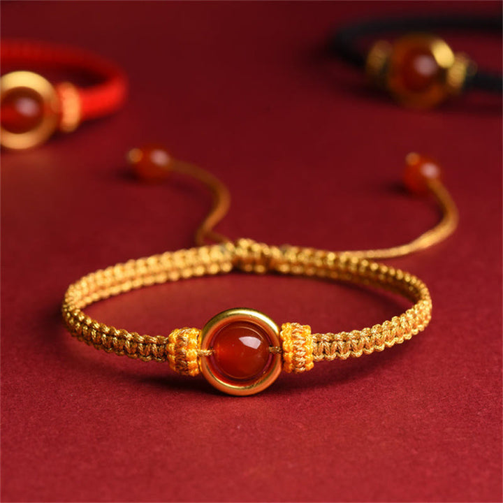 Pulsera de cuerda calma con cuentas de ágata roja y hebilla de paz de Buddha Stones