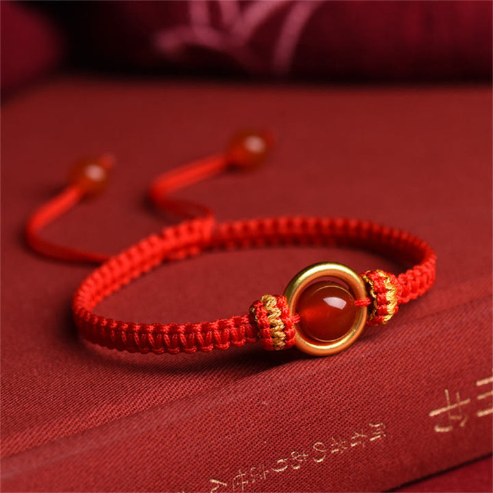 Pulsera de cuerda calma con cuentas de ágata roja y hebilla de paz de Buddha Stones