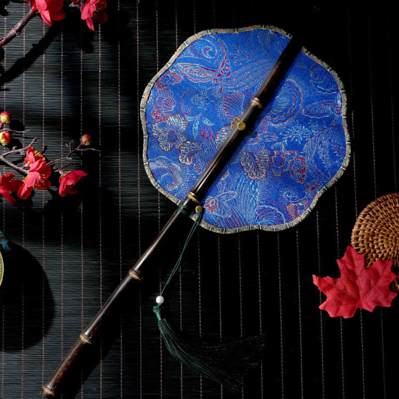 Buddha Stones Abanico portátil enrollable de bambú largo mango morado con diseño de Epiphyllum, hojas y conchas hechas a mano